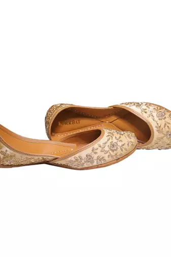 gold ethnic leather juttis with floral embroidery design