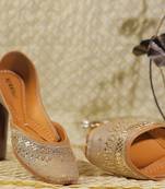 Muted gold embroidered leather juttis