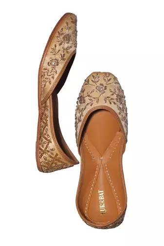 gold ethnic leather juttis with floral embroidery design