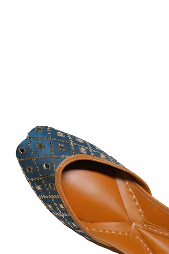 blue leather juttis with decorative thread and sequin work