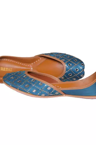 blue leather juttis with decorative thread and sequin work