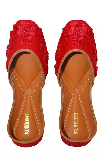 red ethnic leather juttis with floral embroidery work
