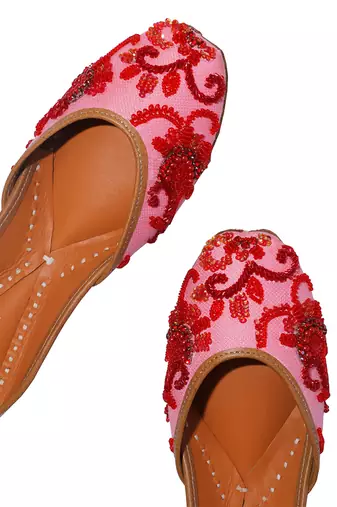 pink embroidered leather juttis with floral embroidery