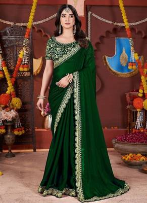 green heavy embroidered silk blend party wear saree 2