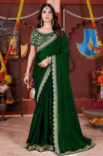 green heavy embroidered silk blend party wear saree