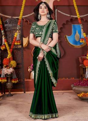 green heavy embroidered silk blend party wear saree 3