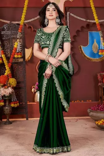 green heavy embroidered silk blend party wear saree