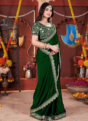 green heavy embroidered silk blend party wear saree 4