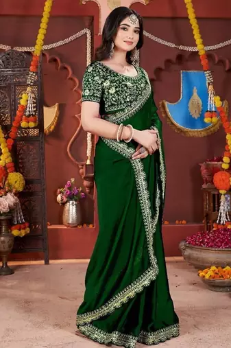 green heavy embroidered silk blend party wear saree