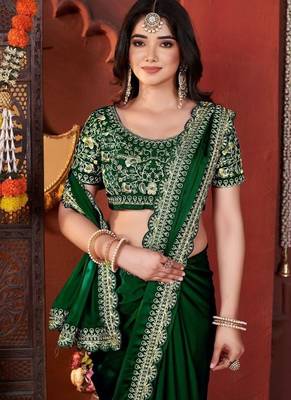 green heavy embroidered silk blend party wear saree 1
