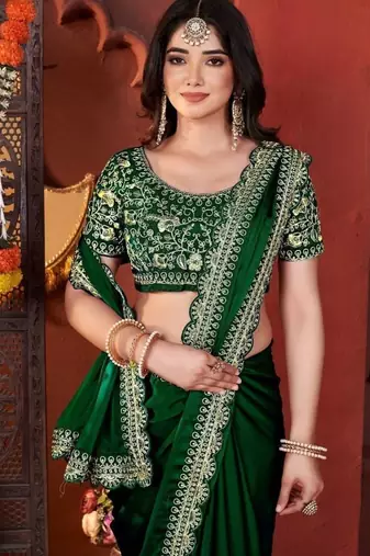 Designer green heavy embroidered silk blend party wear saree with blouse
