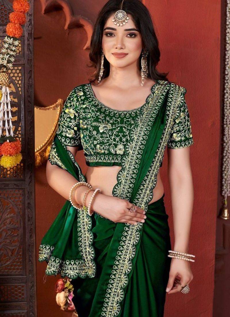 Designer green heavy embroidered silk blend party wear saree with blouse