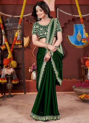 green heavy embroidered silk blend party wear saree 5