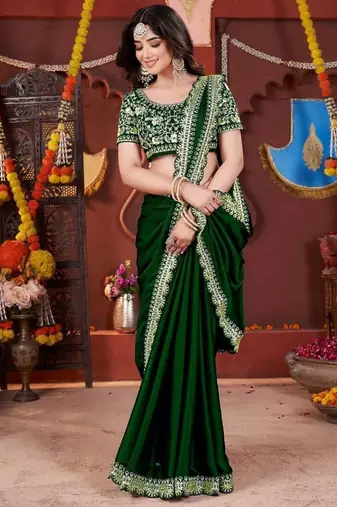 green heavy embroidered silk blend party wear saree