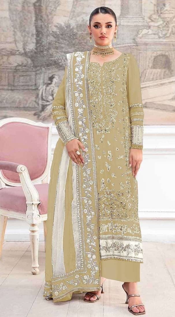 Mustard silk suit with embroidery & khatli work