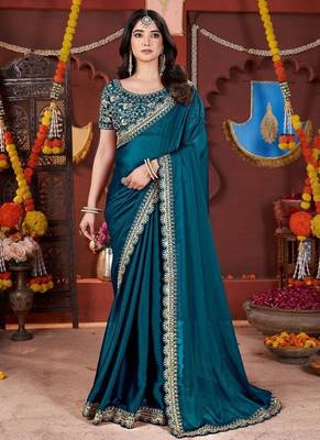 teal heavy embroidered silk blend party wear saree 2