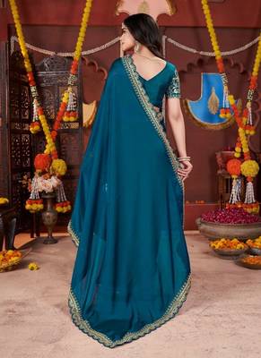 teal heavy embroidered silk blend party wear saree 3