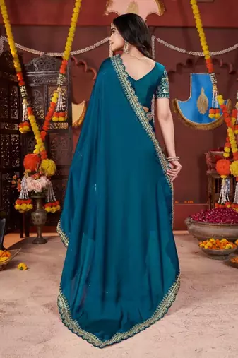 teal heavy embroidered silk blend party wear saree