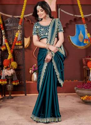 teal heavy embroidered silk blend party wear saree 4