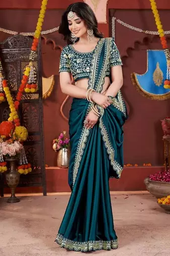 teal heavy embroidered silk blend party wear saree