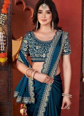 teal heavy embroidered silk blend party wear saree 1