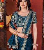 teal heavy embroidered silk blend party wear saree