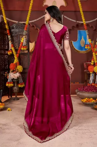 rani pink heavy embroidered silk blend party wear saree