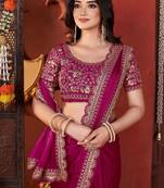 rani pink heavy embroidered silk blend party wear saree