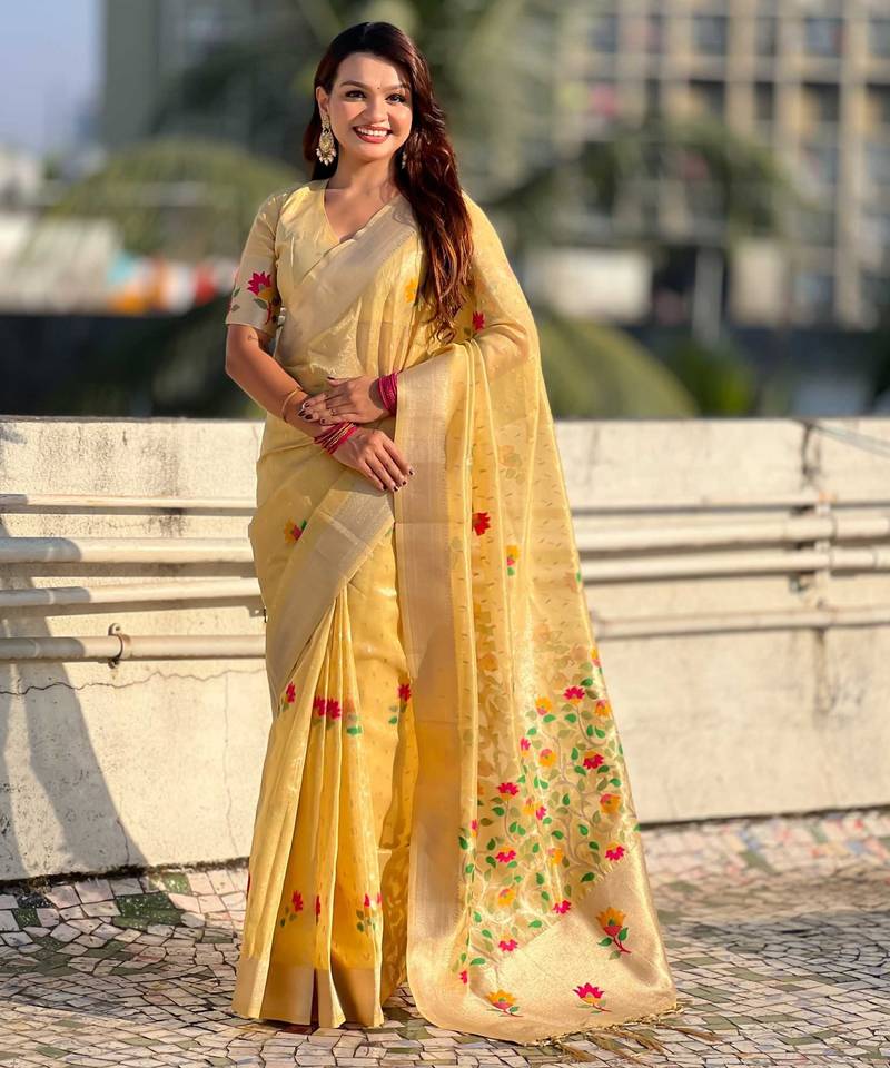 Yellow with multicolor accents  woven zari floral motifs work  silk blend   paithani style saree  with blouse piece