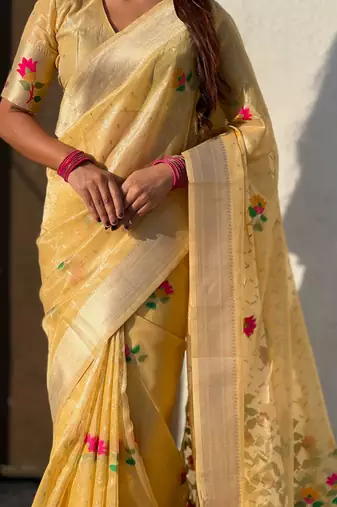 Yellow with multicolor accents  woven zari floral motifs work  silk blend   paithani style saree  with blouse piece