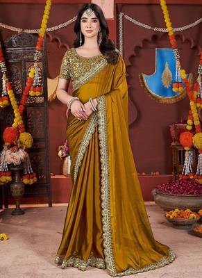 yellow heavy embroidered silk blend party wear saree 2