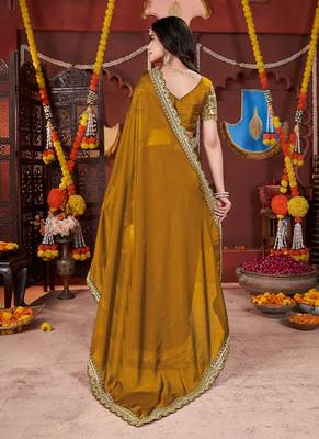 yellow heavy embroidered silk blend party wear saree 3