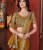 yellow heavy embroidered silk blend party wear saree