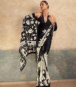 Black printed satin silk saree with unstitched blouse