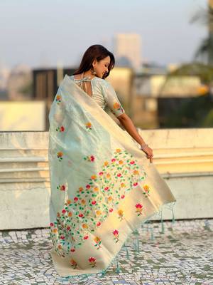 Light blue with multicolor accents  woven zari floral motifs work 
   paithani style saree  with blouse piece 2