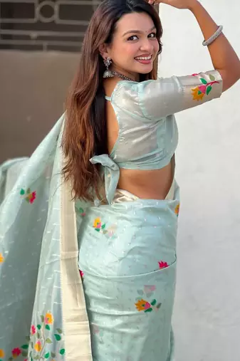 Light blue with multicolor accents  woven zari floral motifs work 
   paithani style saree  with blouse piece