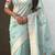 Light blue with multicolor accents  woven zari floral motifs work 
   paithani style saree  with blouse piece
