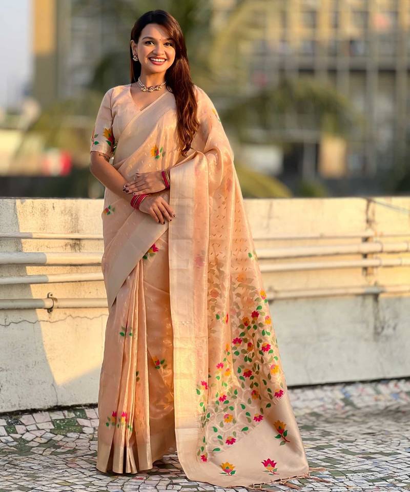 Peach with multicolor accents  woven zari floral motifs work paithani style saree  with blouse piece