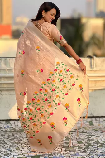 Peach with multicolor accents  woven zari floral motifs work paithani style saree  with blouse piece