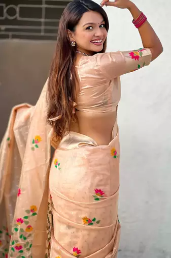 Peach with multicolor accents  woven zari floral motifs work paithani style saree  with blouse piece