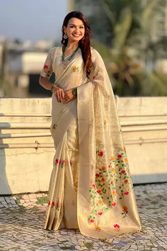 Cream with multicolor accents  woven zari floral motifs work   paithani style saree