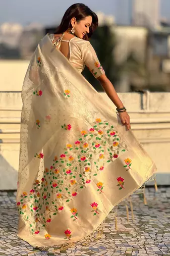 Cream with multicolor accents  woven zari floral motifs work   paithani style saree