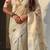 Cream with multicolor accents  woven zari floral motifs work   paithani style saree