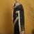 Black with multicolor accents  woven zari small buti & floral border work  silk blend  