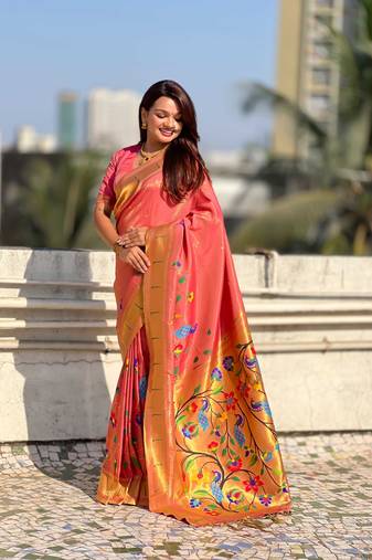 Pink with multicolor accents  woven zari floral & peacock motifs  silk blend  