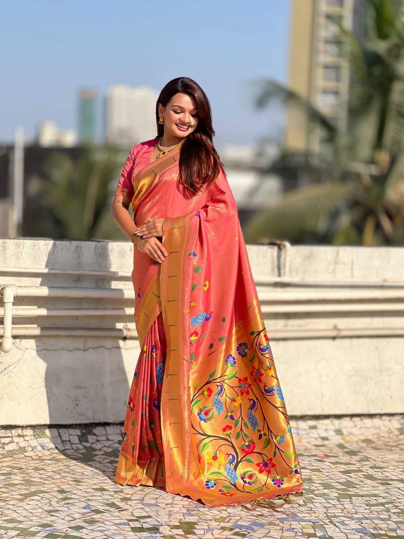 Pink with multicolor accents  woven zari floral & peacock motifs  silk blend  