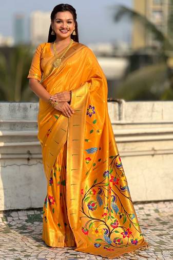 Yellow with multicolor accents  woven zari floral & peacock motifs  silk blend  