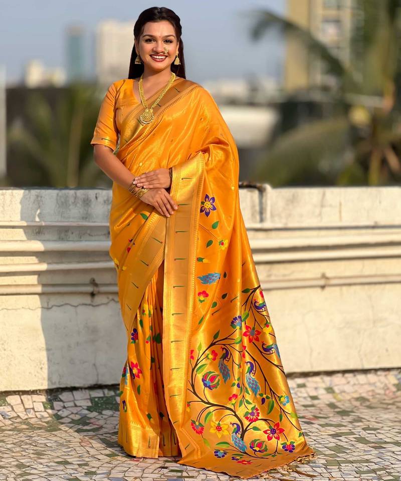 Yellow with multicolor accents  woven zari floral & peacock motifs  silk blend  