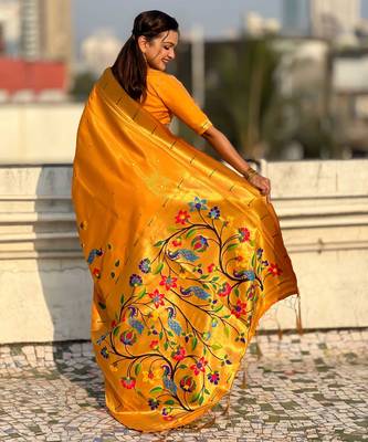 Yellow with multicolor accents  woven zari floral & peacock motifs  silk blend   2