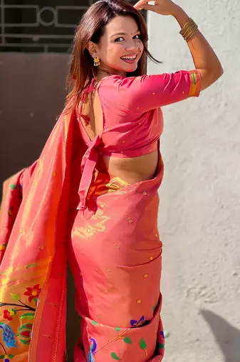 Pink with multicolor accents  woven zari floral & peacock motifs  silk blend  